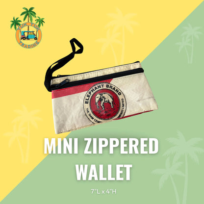 Mini zippered wallet with brand logo on a yellow and green background from TukTuk Trading