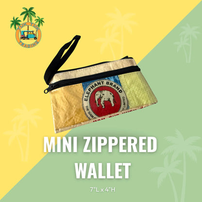 Mini zippered wallet with Elephant Brand logo on a yellow and green background from TukTuk Trading