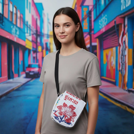 woman wearing lotus print crossbody bag from TukTuk Trading