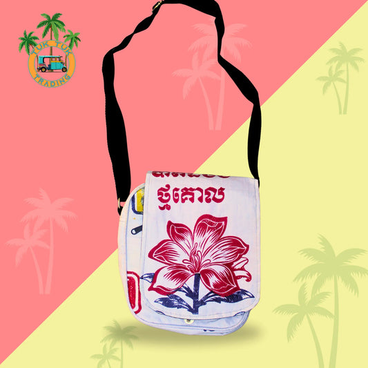 Floral-patterned bag with text on a pink and yellow background from TukTuk Trading