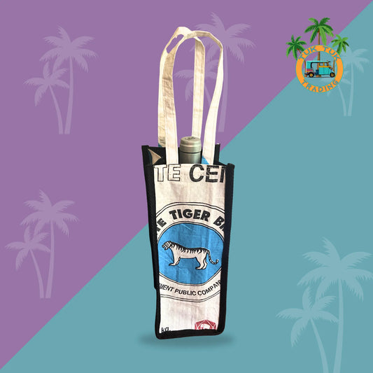 Wine tote bag with a brand logo on a colorful background with palm tree silhouettes available shoptuktuk.com