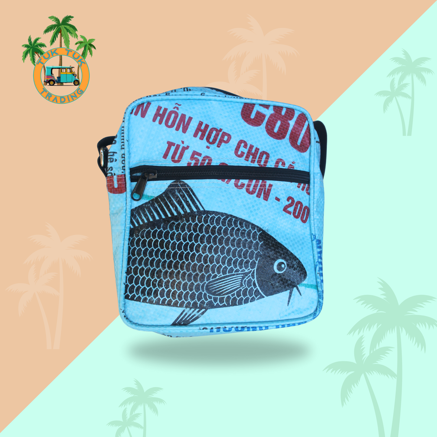 Blue bag with fish design and text on a colorful background available at ShopTukTuk.com